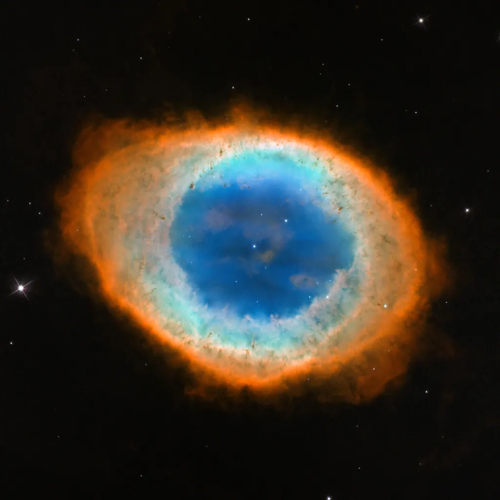 Mgławica Pierścień – zdjęcie wykonane przez Teleskop Hubble’a[a]  NASA, ESA, and C. Robert O’Dell (Vanderbilt University) - http://www.spacetelescope.org/images/heic1310a/