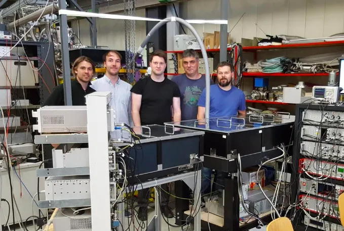 The team of researchers from PTB and LMU during research work in the Maier-Leibnitz Laboratory of LMU and Technical University of Munich (TUM) in Garching near Munich. From left to right: Lars von der Wense, Benedict Seiferle, Johannes Thielking, Maxim V. Okhapkin, Przemysław Głowacki*. (PTB- Physikalisch-Technische Bundesanstalt Braunschweig, LMU - Ludwig Maximilian University in Munich, *currently PUT - Poznan University of Technology). Photo: P. Głowacki