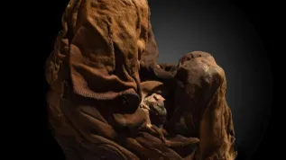 Children's remains were wrapped in fabrics. Photo: D. Socha