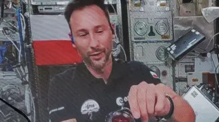 Łódź, 02.07.2025. Przebywający na Międzynarodowej Stacji Kosmicznej polski astronauta Sławosz Uznański-Wiśniewski. PAP/Marian Zubrzycki