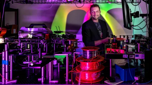 Doctoral candidate Piotr Węgrzyn presents the research equipment used at ICTER in the work on the eye examination technology. Credit: Dr. Karol Karnowski.