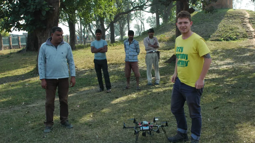 Kasper Hanus prepares the drone for flight. Photo by E. Smagur.