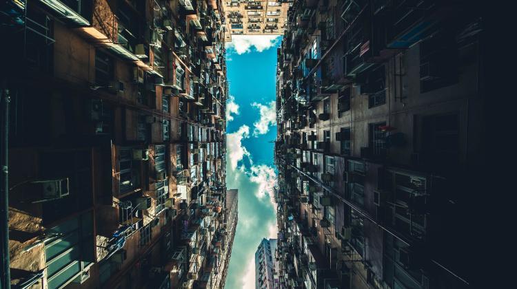 Access to natural light is limited by ever taller buildings in cities and the lack of proper distance between them. Photo: Rikki Chan/Unsplash