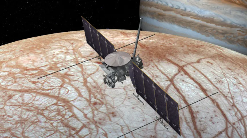 Artystyczna wizja sondy Europa Clipper nad księżycem Europa w pobliżu Jowisza. Źródło: NASA/JPL-Caltech