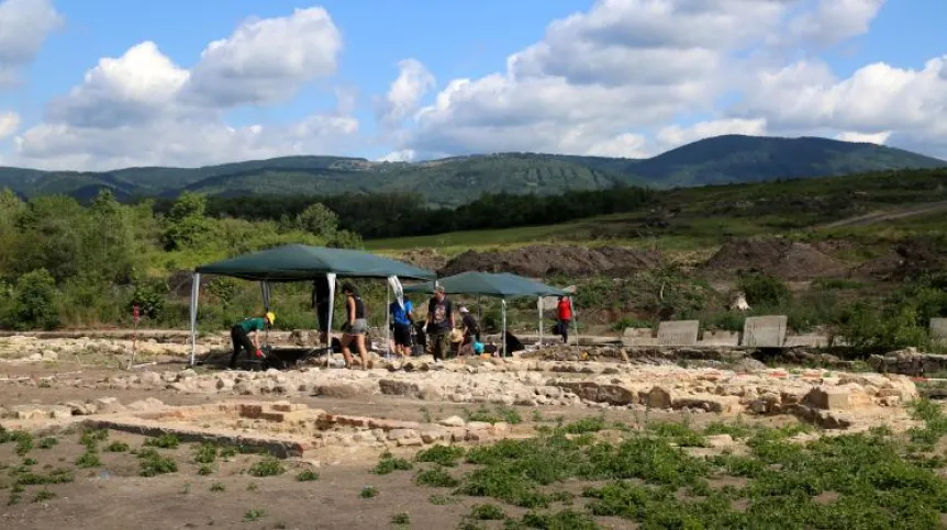 The centre of the abandoned village of Libkovice was occupied by the St. Archangel Michael Church; researchers from Poland study its relics and the surrounding cemetery. Photo by P. Konczewski
