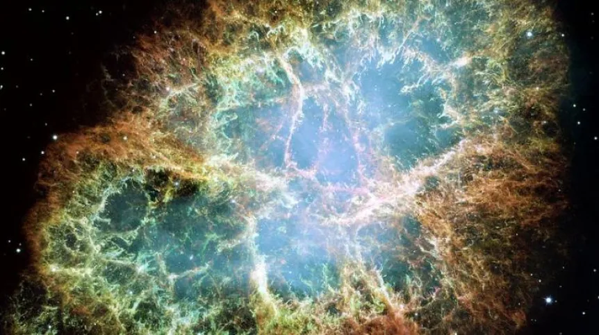 Crab Nebula. It is thought to be the remains of a star explosion in our galaxy almost 1,000 years ago (a supernova noticed by Chinese and Arab astronomers in 1054). Credit: NASA, ESA, J. Hester and A. Loll (Arizona State University).