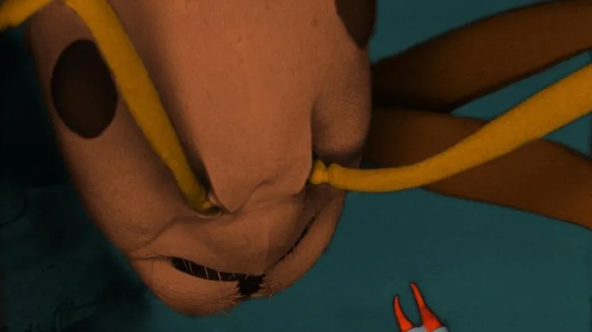 The optical pliers next to the mandibles of a Formica polyctena ant for comparison (composite scanning electron microscope (SEM) image with added colors). The two jaws (red) close when light is sent through the optical fibers (light blue) that have the diameter of 125 microns, comparable to the diameter of a human hair. (Source: UW Physics)