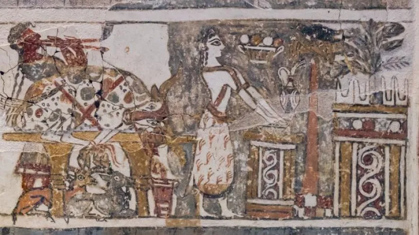 The unique depiction on the Hagia Triada sarcophagus has been reinterpreted by researchers as ritual washing of hands after sacrificing a bull. The fragment shows a priestess washing her hands in a wide bowl after making an offering of a bull. Credit: ArchaiOptix. Shared under an Attribution-ShareAlike 4.0 International (CC BY-SA 4.0) license.