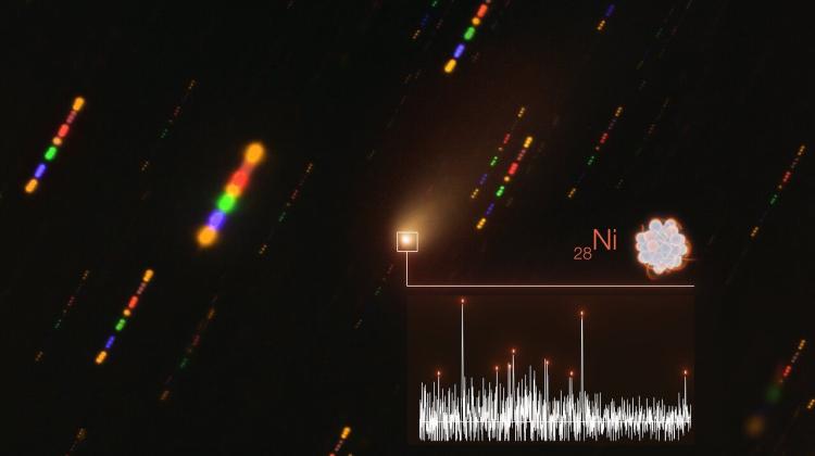 The image illustrates the detection of nickel in the atmosphere of the interstellar comet 2I/Borisov. The spectrum of the comet's light (bottom right) is superimposed on a real image of the comet taken with the VLT in late 2019. Orange dashes represent the nickel lines. Credit: ESO/L. Calçada/O. Hainaut, P. Guzik and M. Drahus.