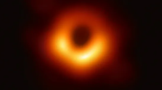 Image of the object M87* with a supermassive black hole at its centre, located in the core of the M87 galaxy; generated based on data obtained with the Event Horizon Telescope, source: Wikipedia